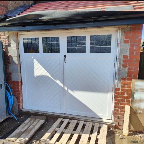 Custom wood garage doors with windows
